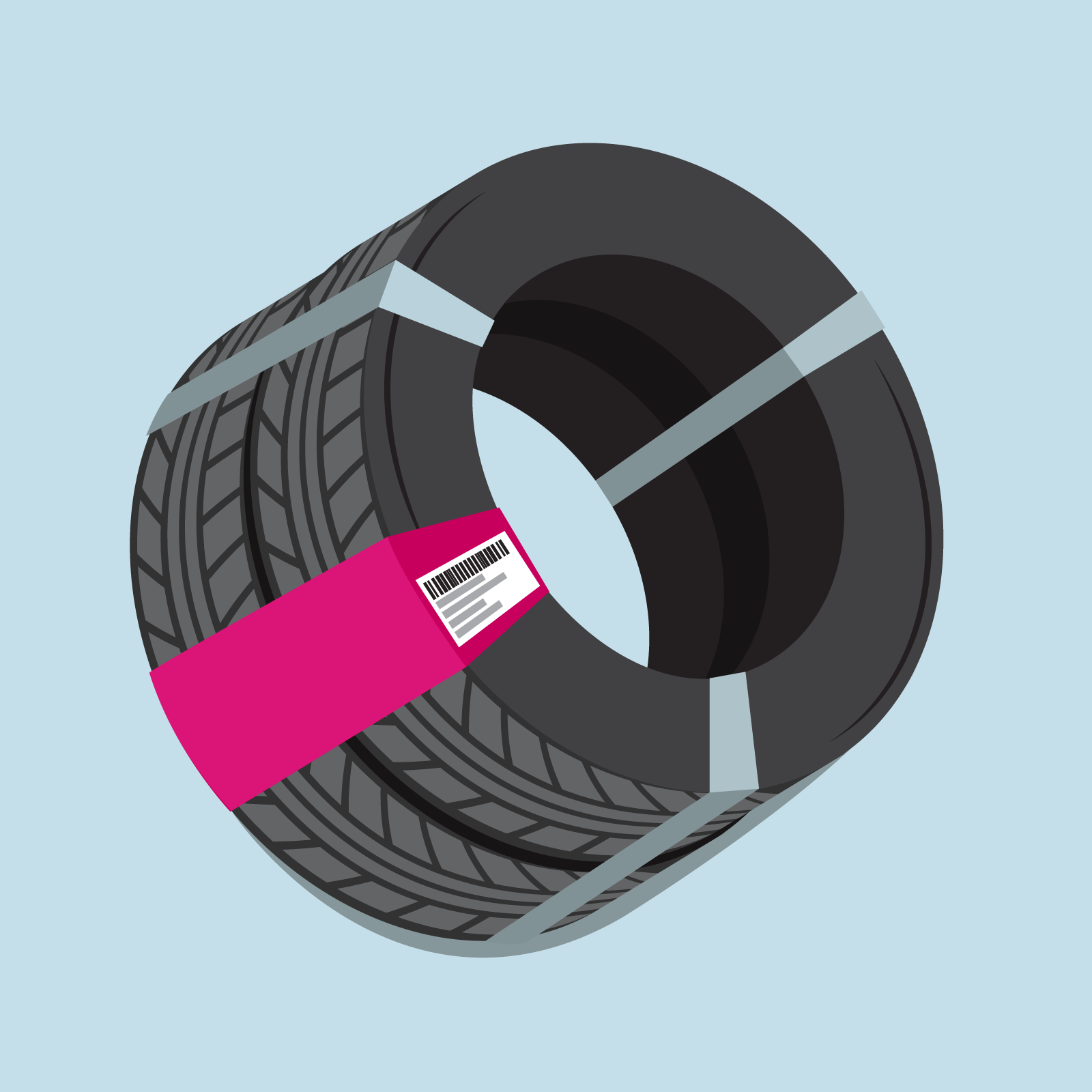 Dwie opony spięte razem taśmą z etykietą